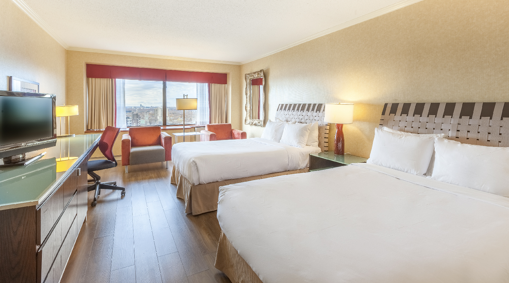 Room with 2 Double Beds of Hotel Le Concorde Quebec